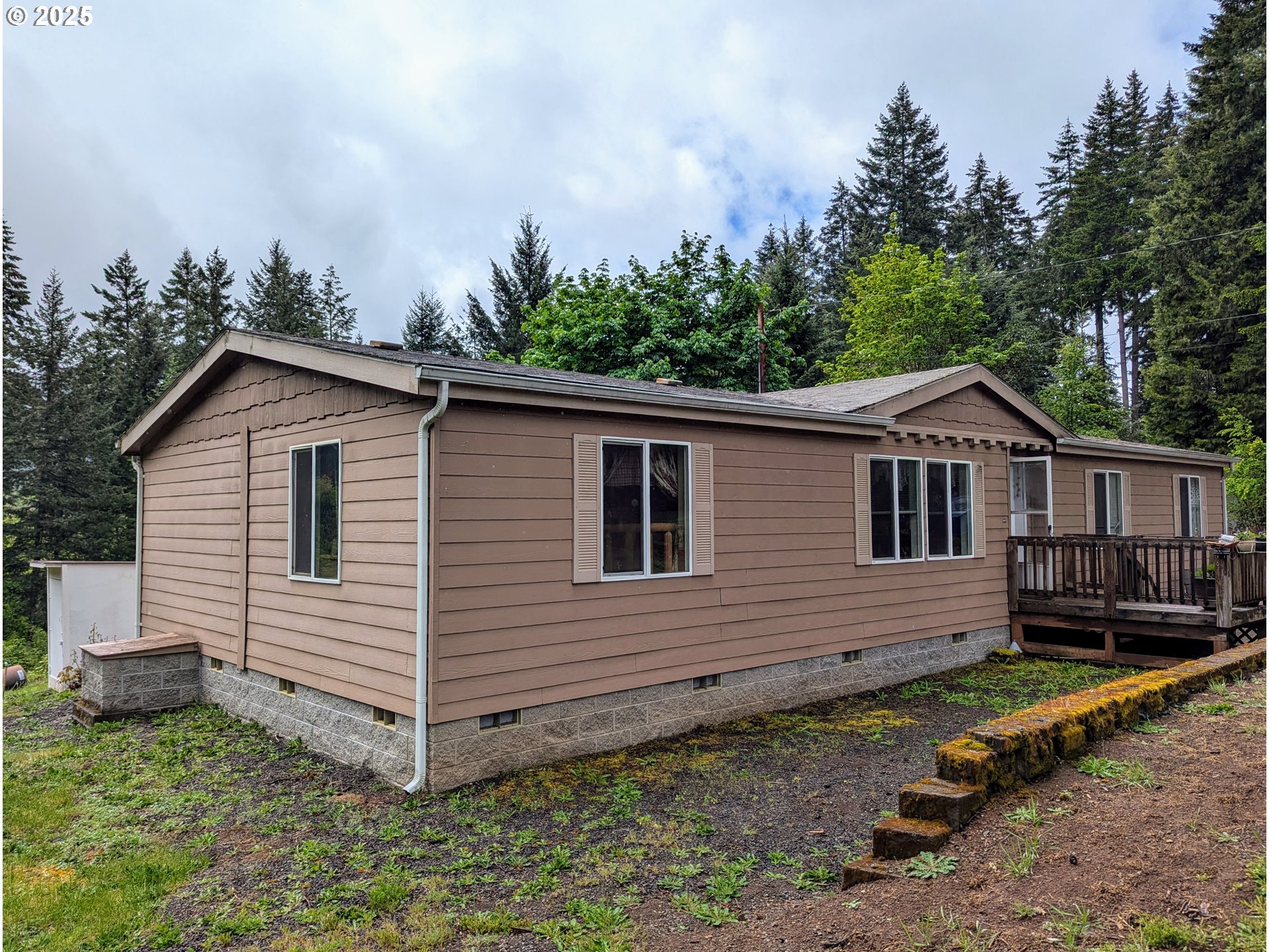 49244 Mountain View Road Oakridge, OR 97463 - Photo 24 of 30 a view of a house with a yard