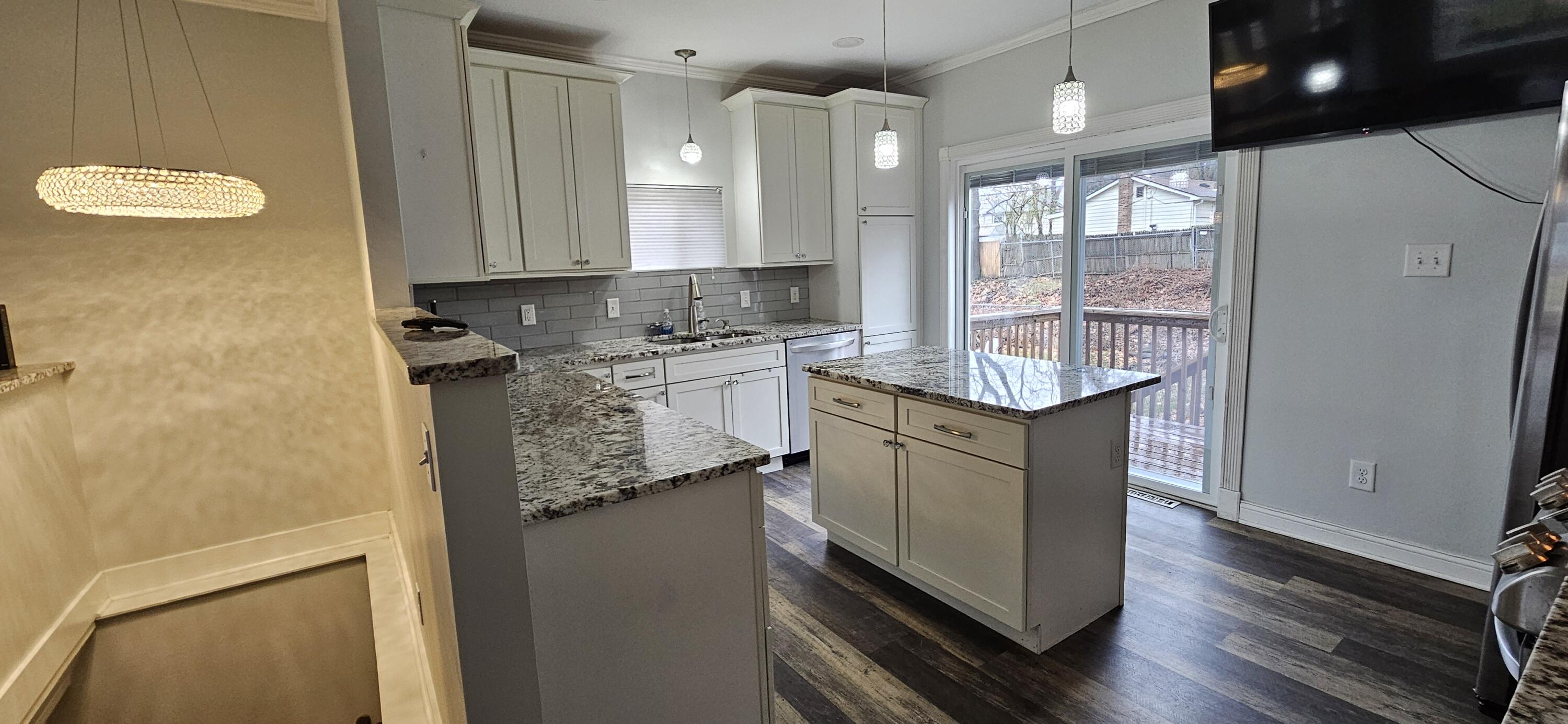 7419 Maple Avenue Gary, IN 46403 - Photo 13 of 93 a kitchen with stainless steel appliances granite countertop a sink stove and refrigerator