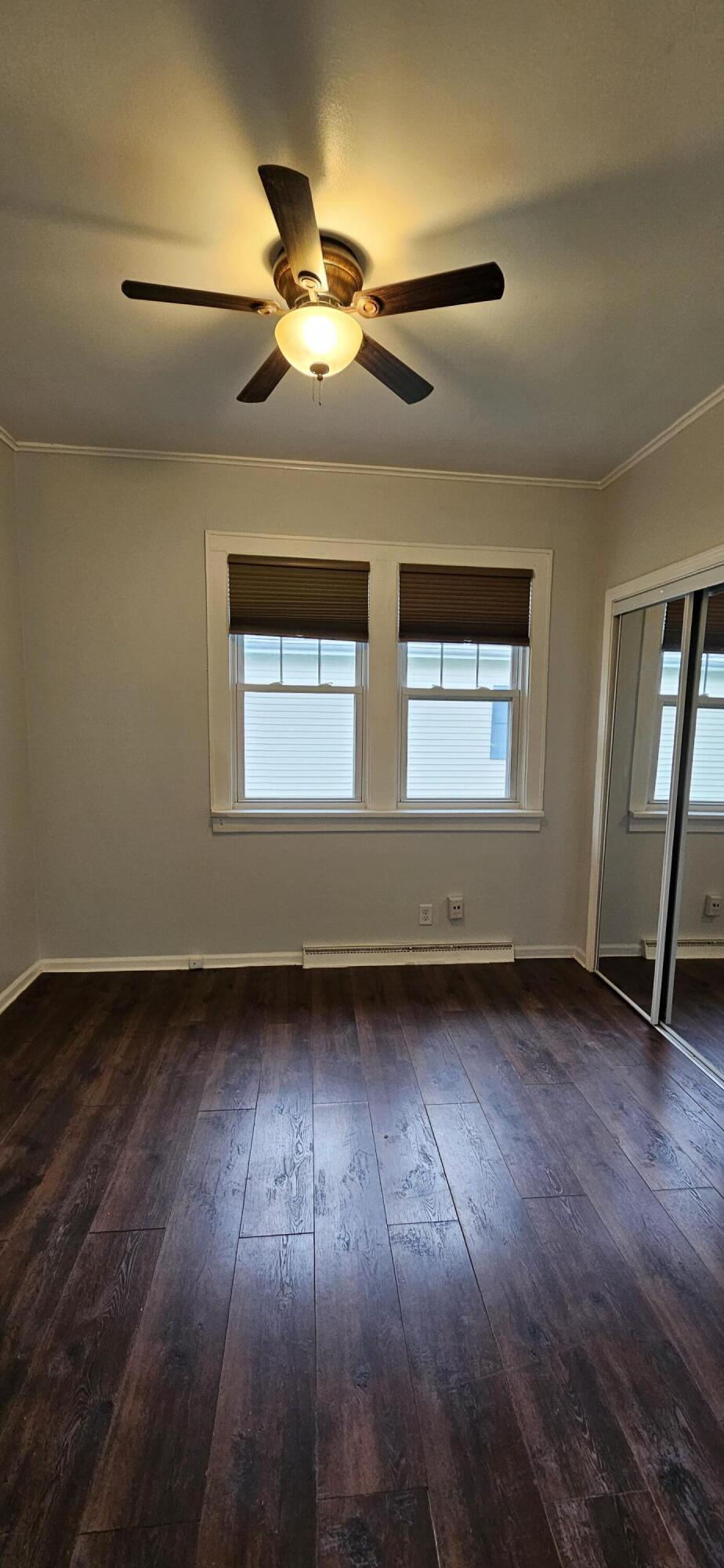 7419 Maple Avenue Gary, IN 46403 - Photo 45 of 93 a view of an empty room with wooden floor and a window