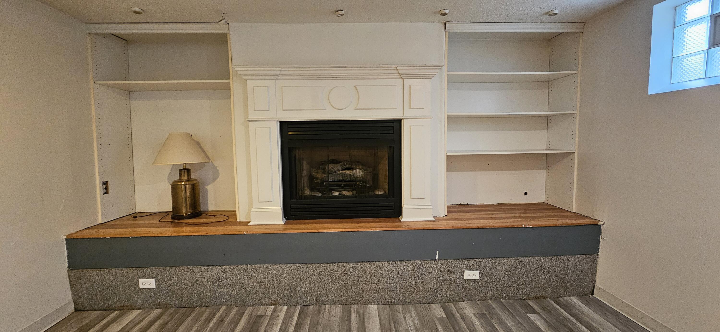 7419 Maple Avenue Gary, IN 46403 - Photo 64 of 93 a living room with a bed and a fireplace