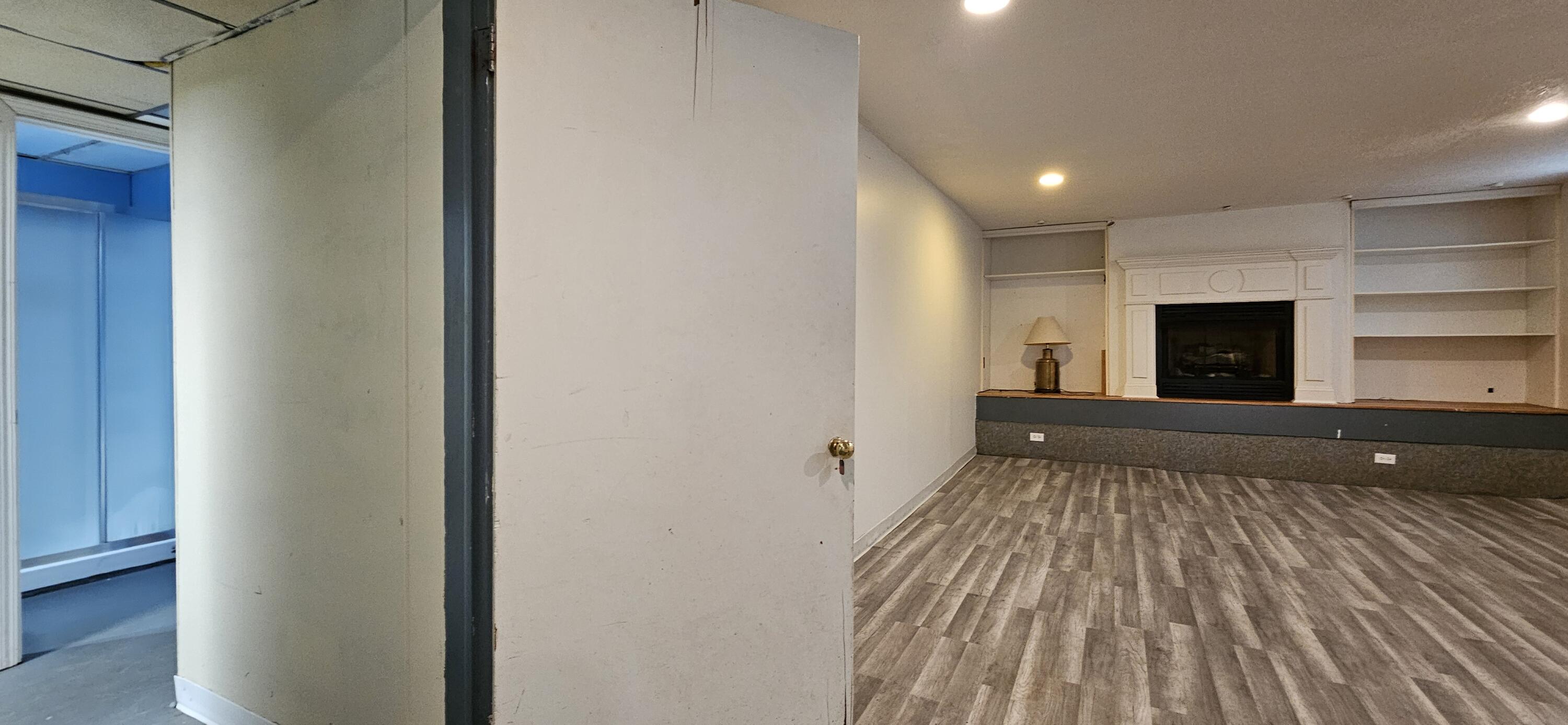 7419 Maple Avenue Gary, IN 46403 - Photo 65 of 93 a view of empty room with wooden floor and fan