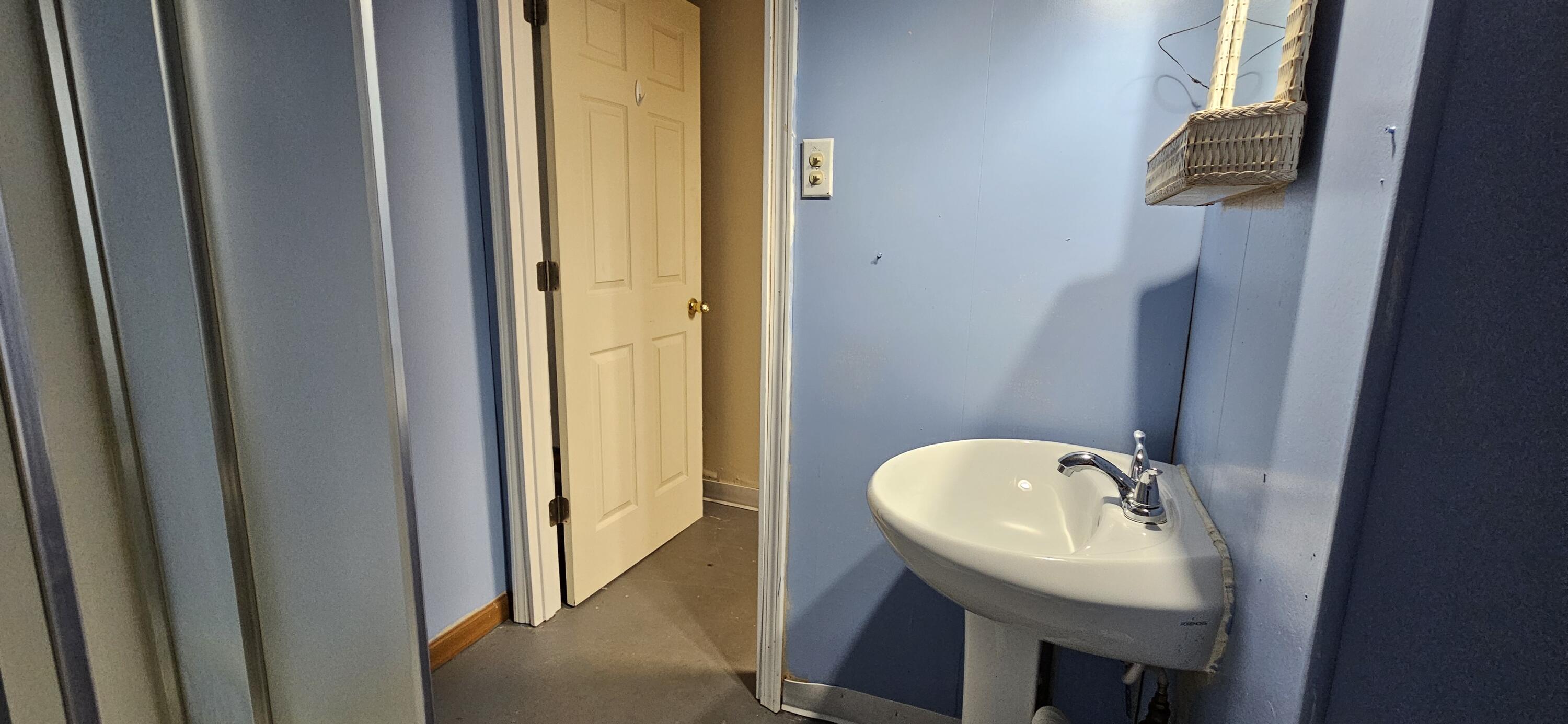 7419 Maple Avenue Gary, IN 46403 - Photo 69 of 93 a bathroom with a sink and a mirror
