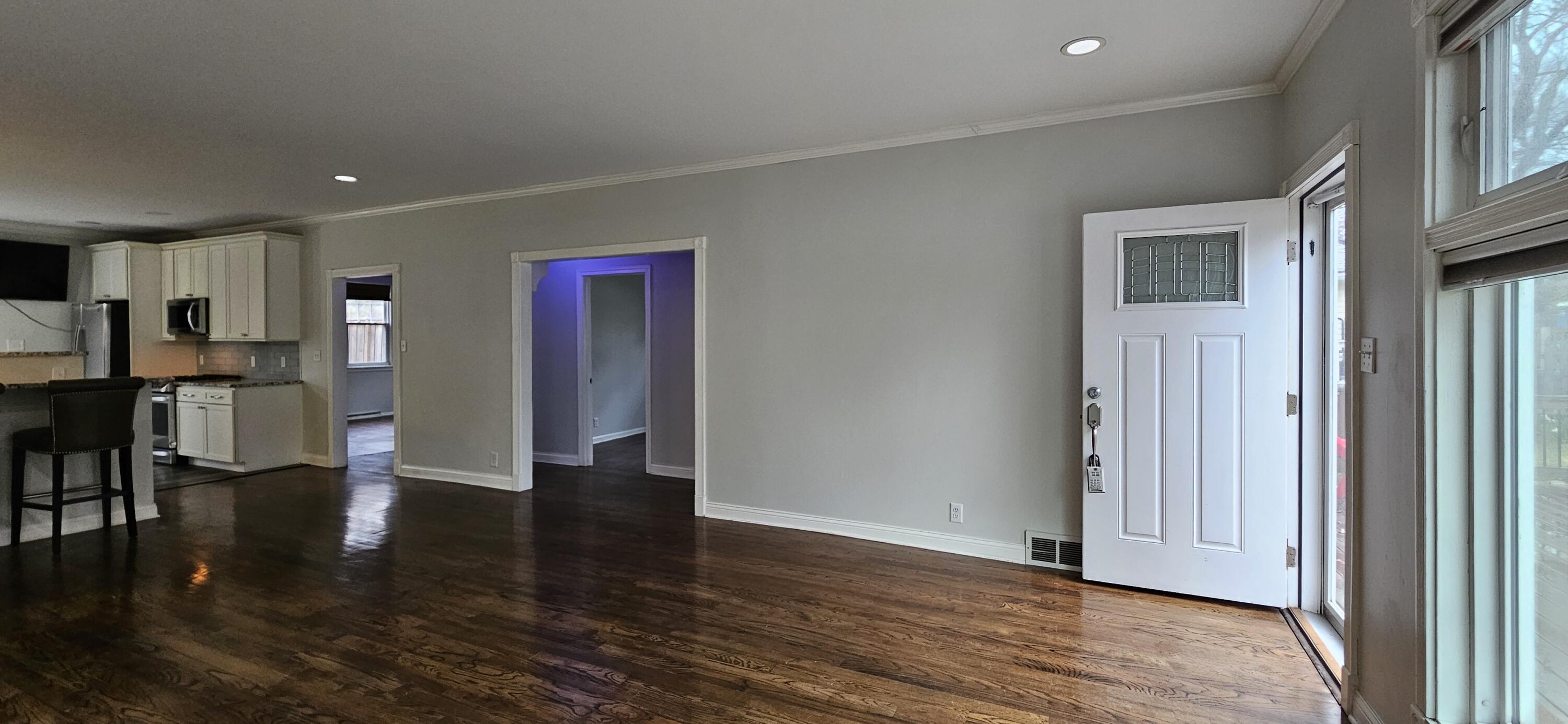 7419 Maple Avenue Gary, IN 46403 - Photo 8 of 93 a view of a livingroom with wooden floor and furniture