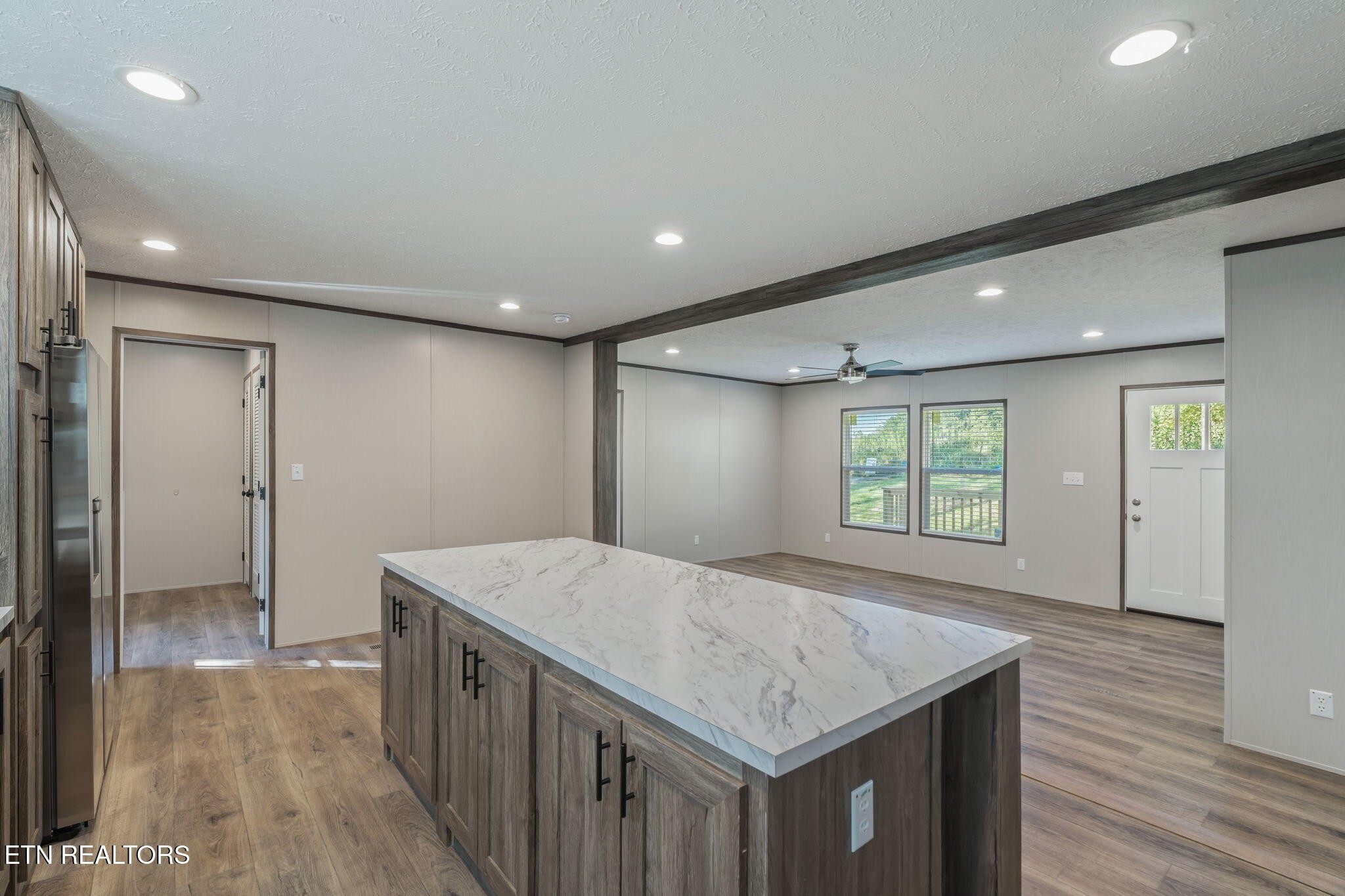 400 Matlock Trail Loudon, TN 37774 - Photo 12 of 50 a kitchen with a wooden floor and entrance