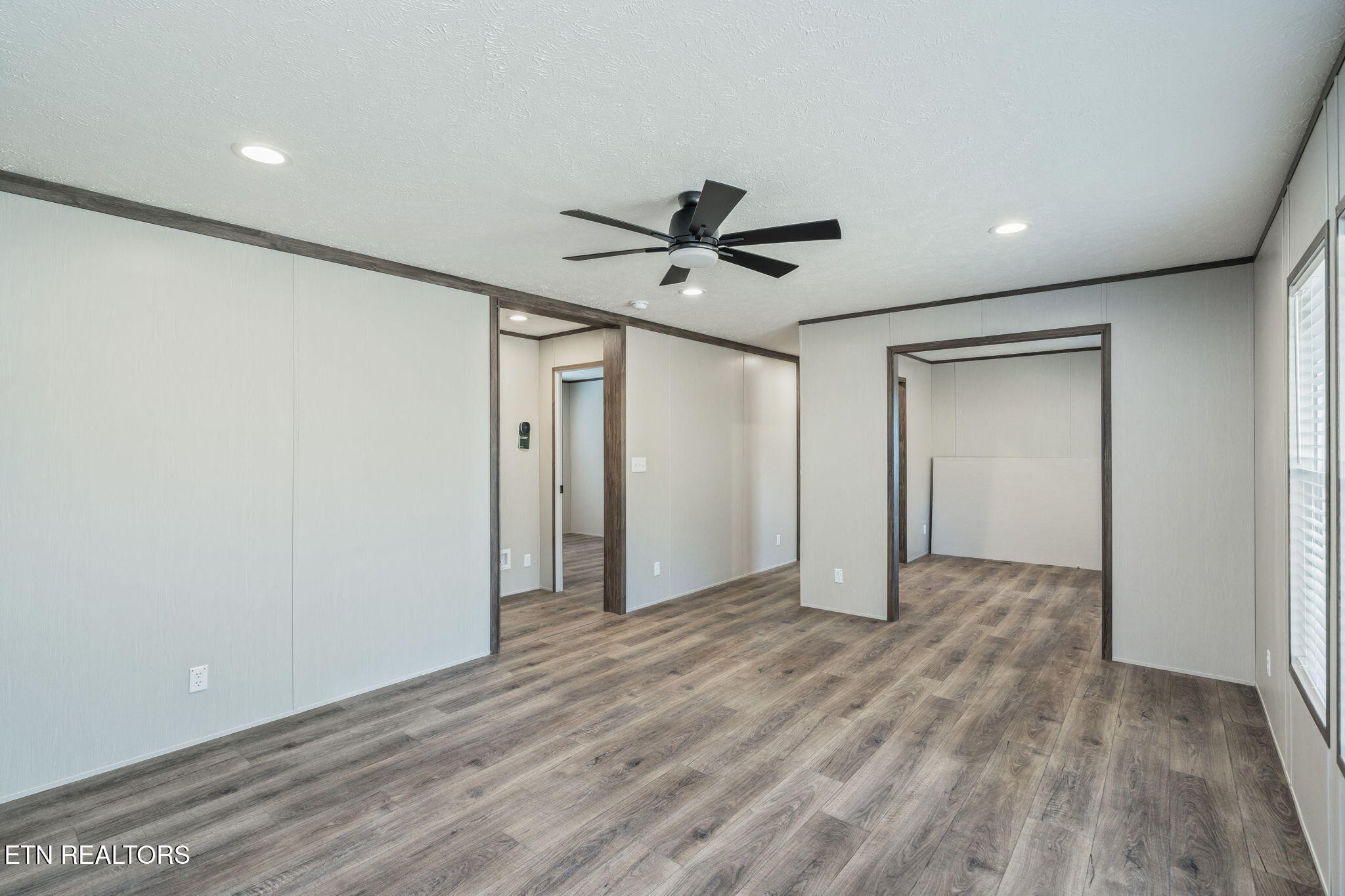 400 Matlock Trail Loudon, TN 37774 - Photo 30 of 50 a view of an empty room with a ceiling fan