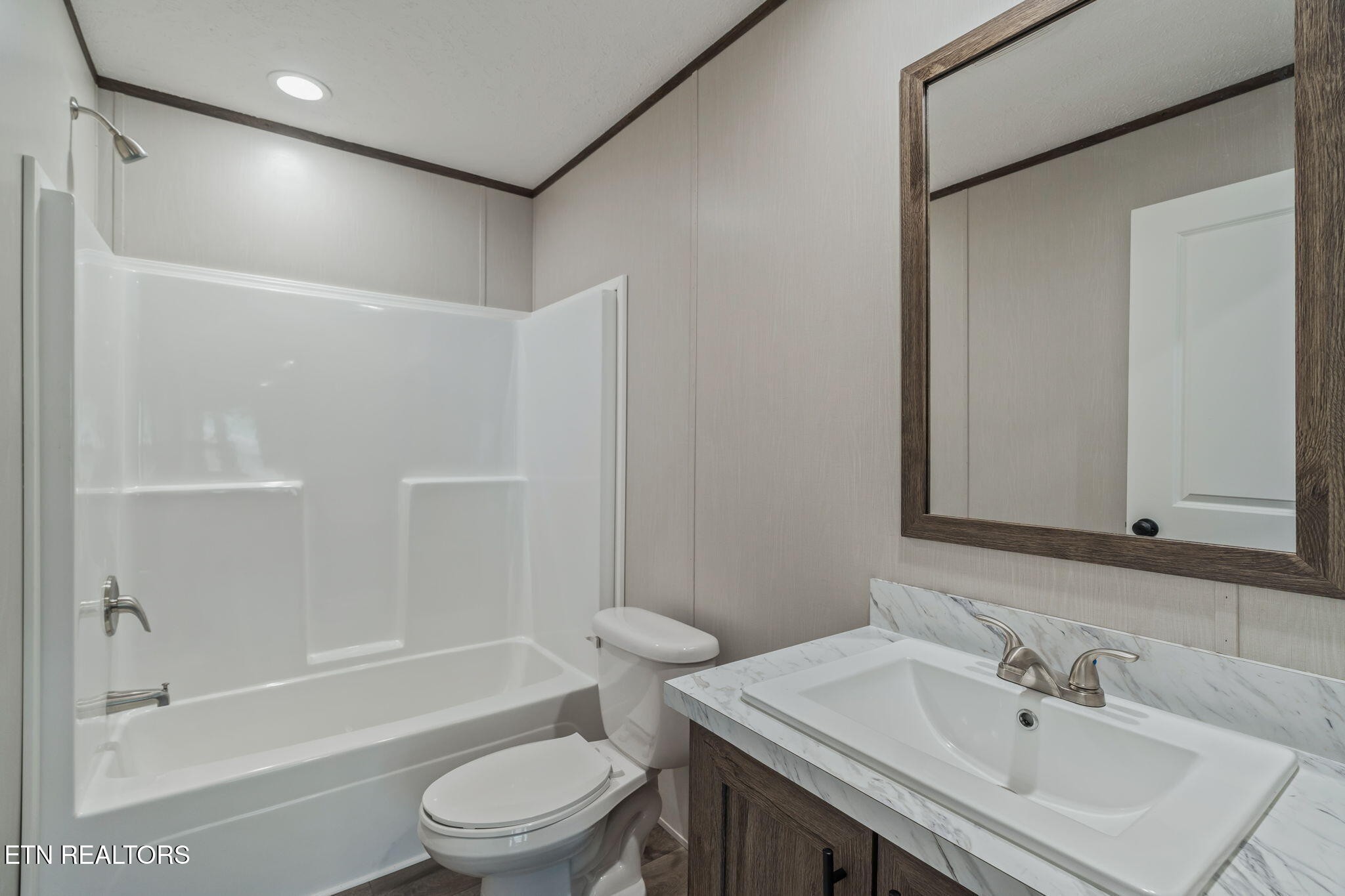 400 Matlock Trail Loudon, TN 37774 - Photo 31 of 50 a bathroom with a sink toilet and a bathtub
