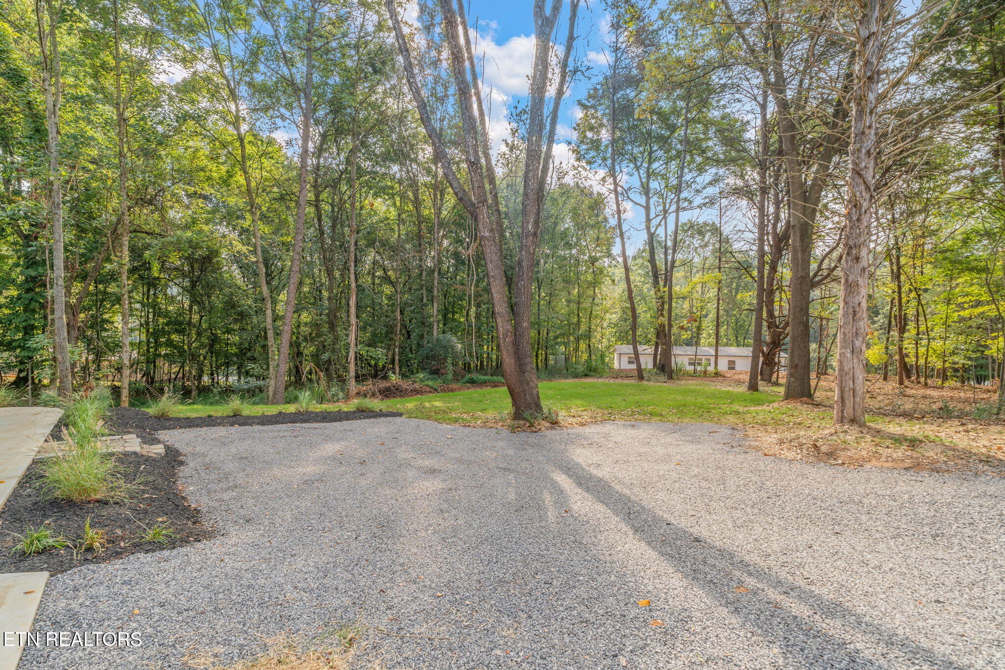 400 Matlock Trail Loudon, TN 37774 - Photo 47 of 50 a view of a house with a big yard and large trees
