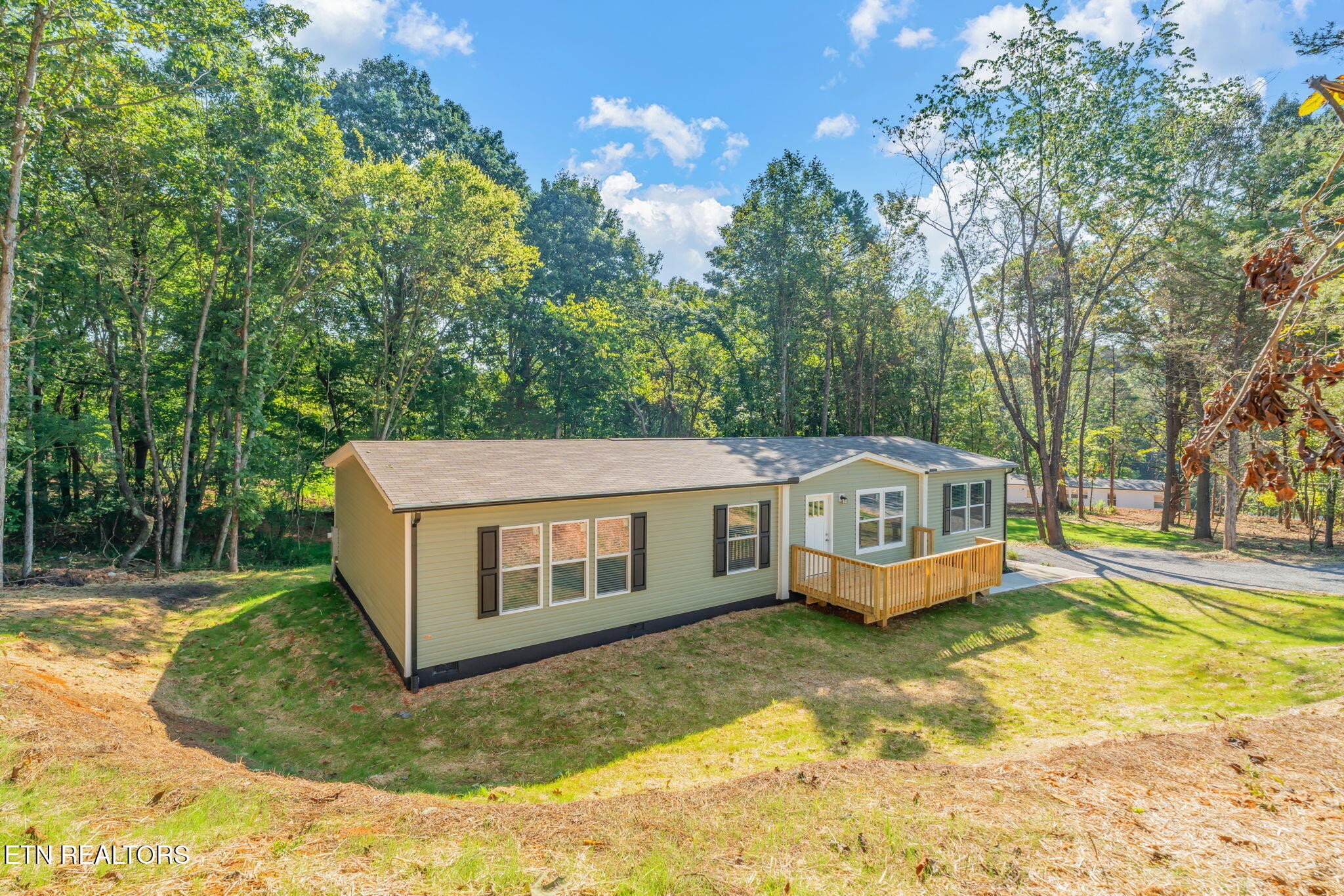 400 Matlock Trail Loudon, TN 37774 - Photo 50 of 50 a view of a white house with a big yard and large trees