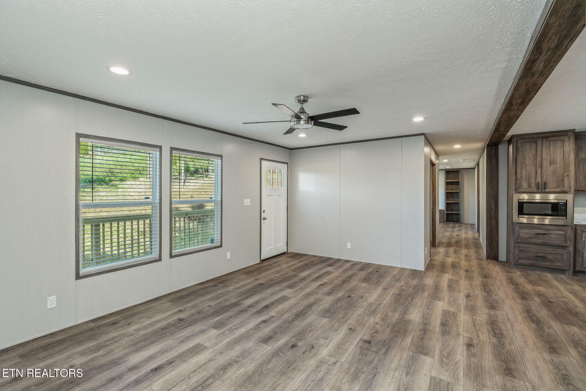 400 Matlock Trail Loudon, TN 37774 - Photo 5 of 50 a view of a livingroom with a ceiling fan and window