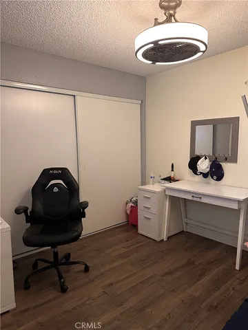 a room with a sink and cabinets