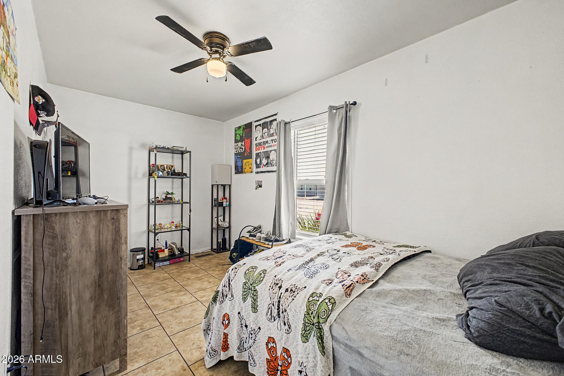 625 West McKellips Road, Unit 393 Mesa, AZ 85201 - Photo 14 of 21 a bedroom with a large bed and a window