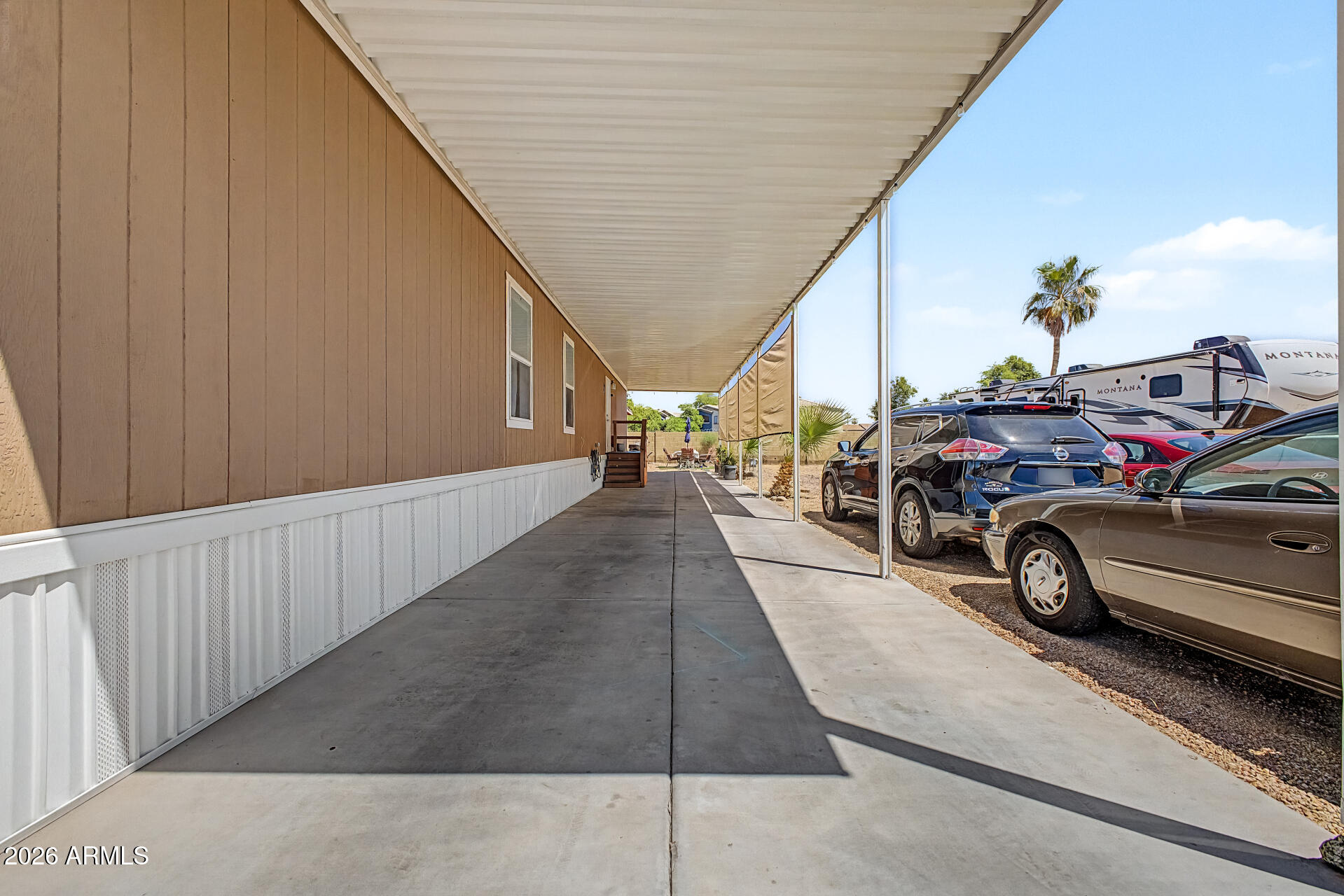625 West McKellips Road, Unit 393 Mesa, AZ 85201 - Photo 20 of 21 a view of car parked in garage