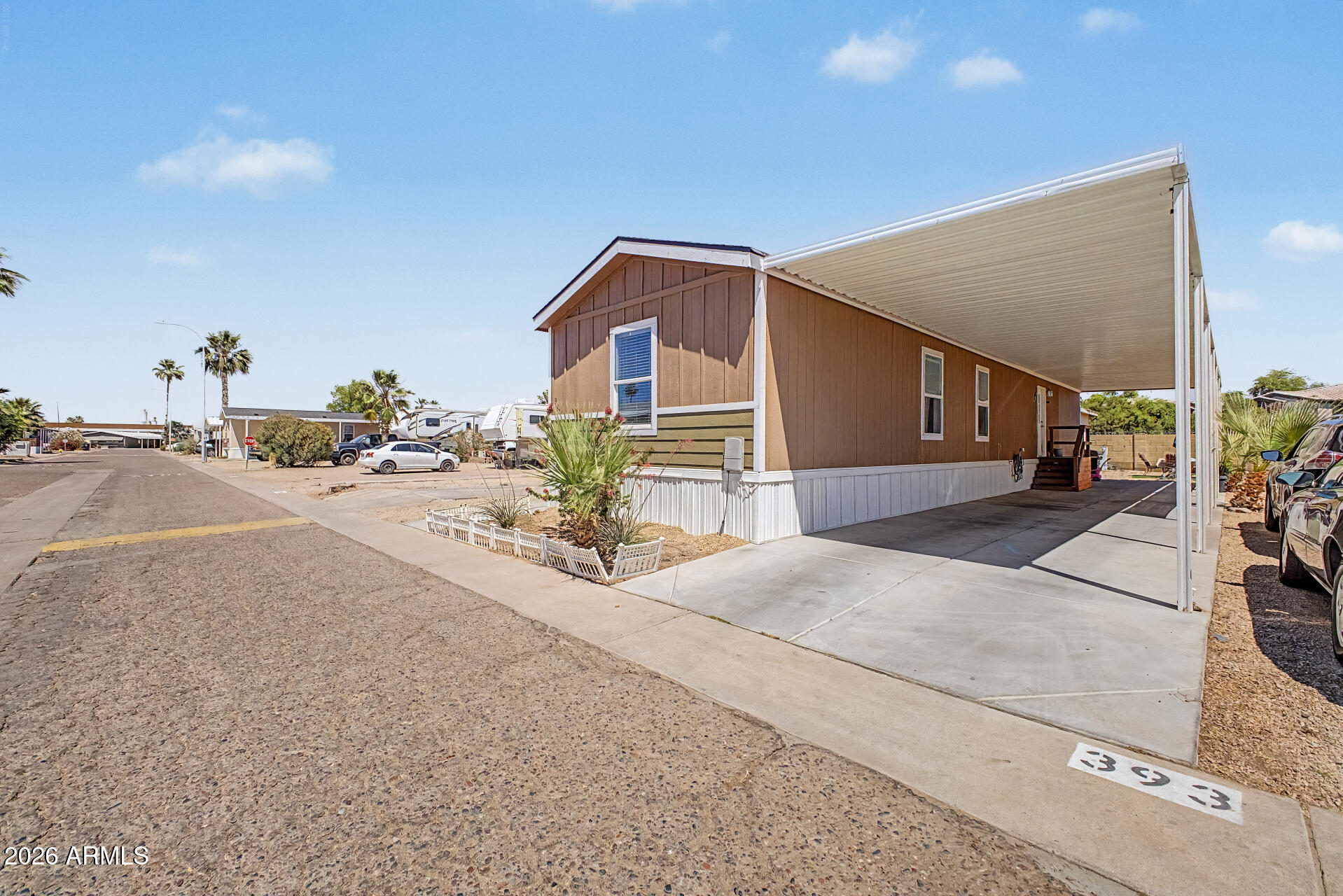 625 West McKellips Road, Unit 393 Mesa, AZ 85201 - Photo 3 of 21 a view of a house with a outdoor space