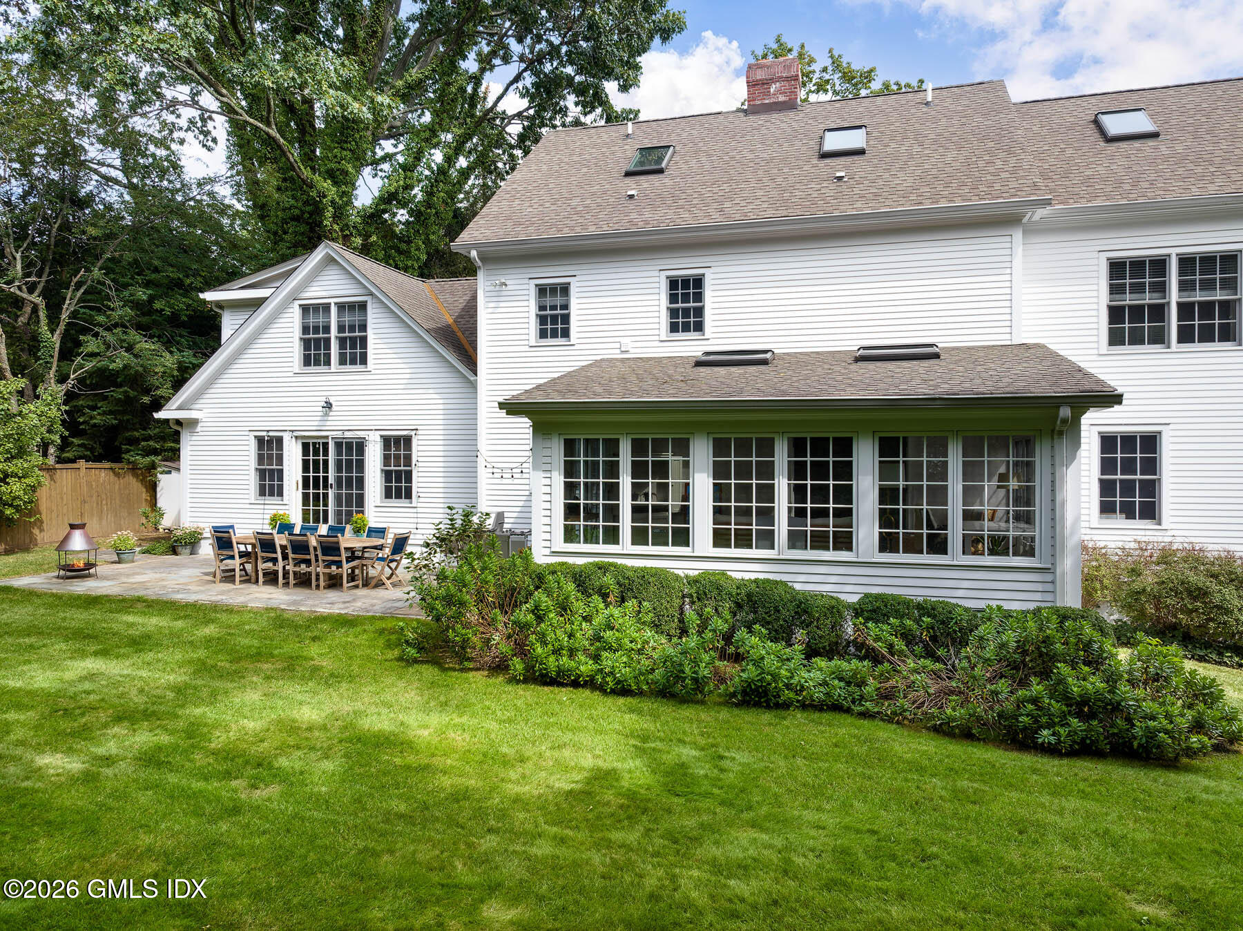 274 Riverside Avenue Riverside, CT 06878 - Photo 18 of 21 a front view of a house with a garden and porch