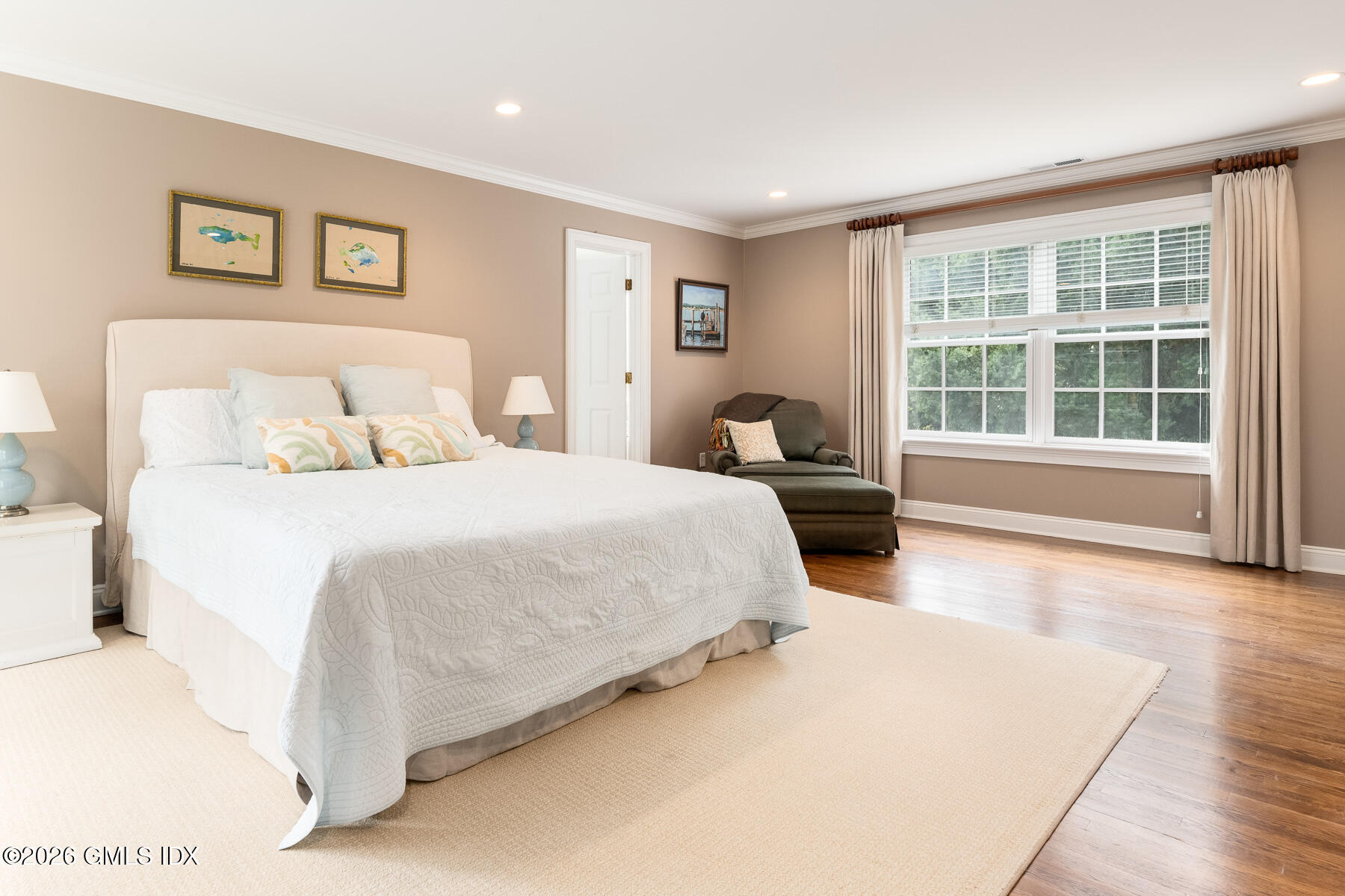 274 Riverside Avenue Riverside, CT 06878 - Photo 10 of 21 a bedroom with a large bed and a large window