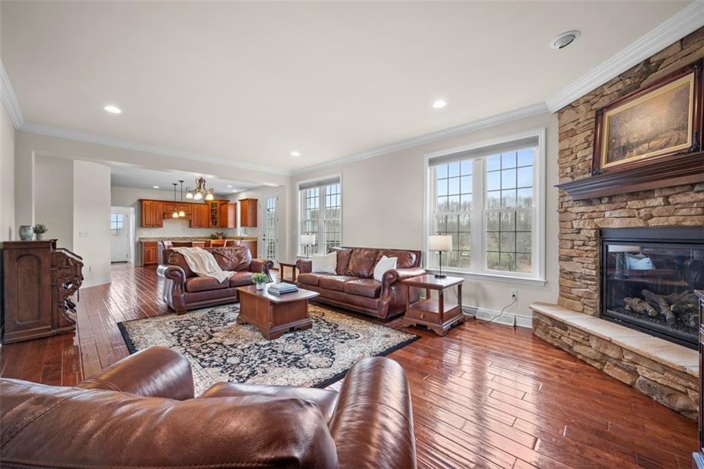136 Hammond Road Mars, PA 16046 - Photo 11 of 48 a living room with furniture and a fireplace