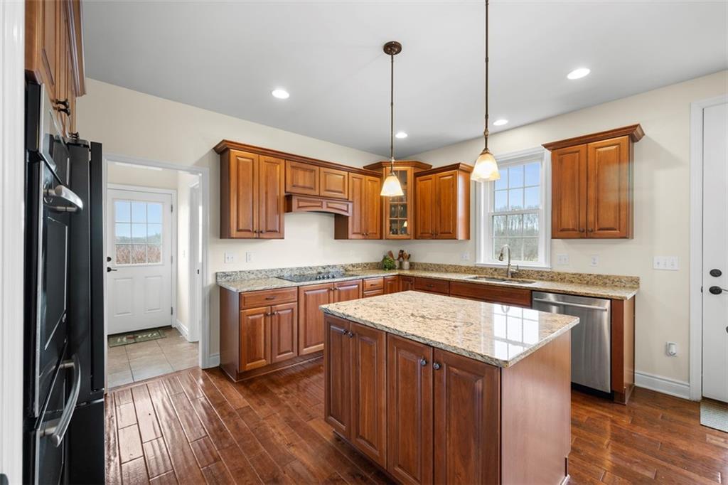 136 Hammond Road Mars, PA 16046 - Photo 14 of 48 a kitchen with a sink stove and refrigerator
