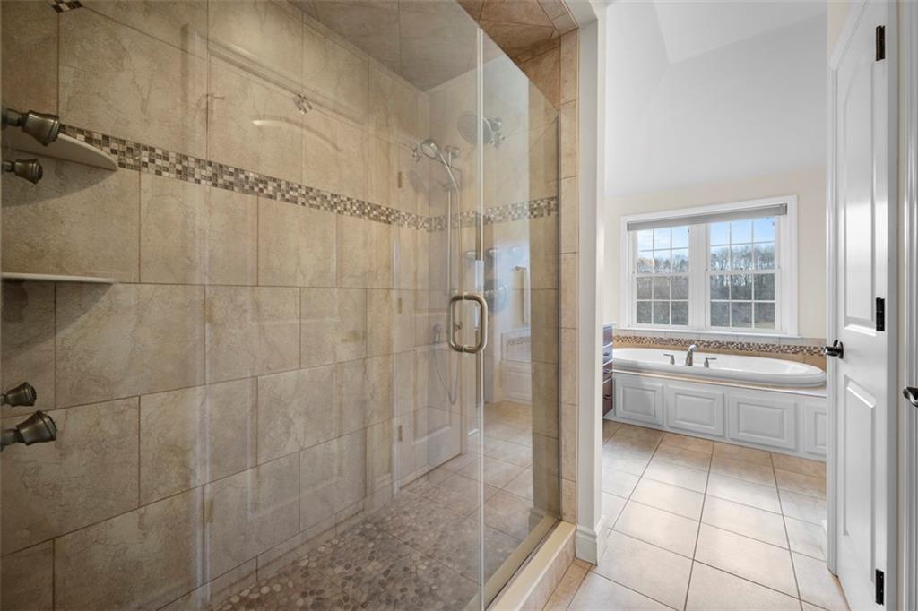 136 Hammond Road Mars, PA 16046 - Photo 25 of 48 a bathroom with a granite countertop bathtub a shower and a sink