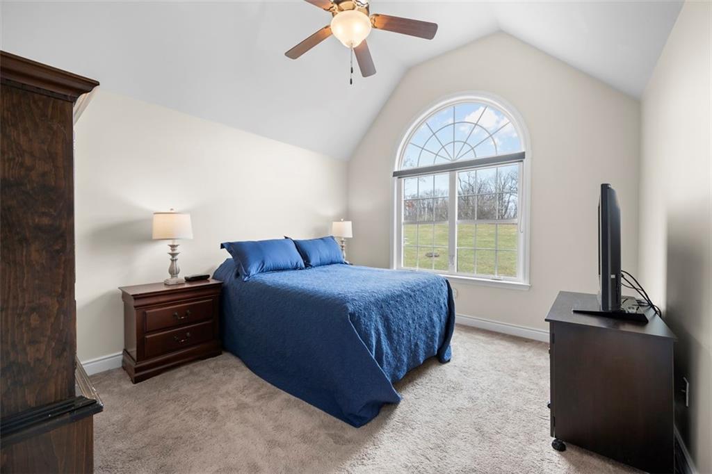 136 Hammond Road Mars, PA 16046 - Photo 29 of 48 a bedroom with a bed and a chandelier