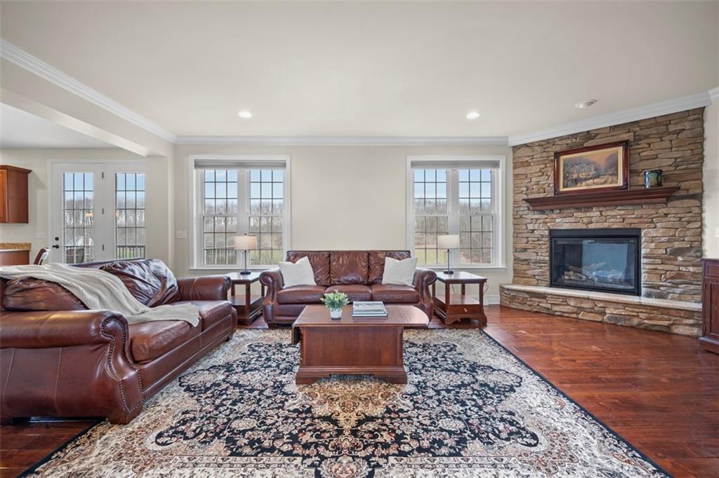 136 Hammond Road Mars, PA 16046 - Photo 7 of 48 a living room with furniture and a fireplace
