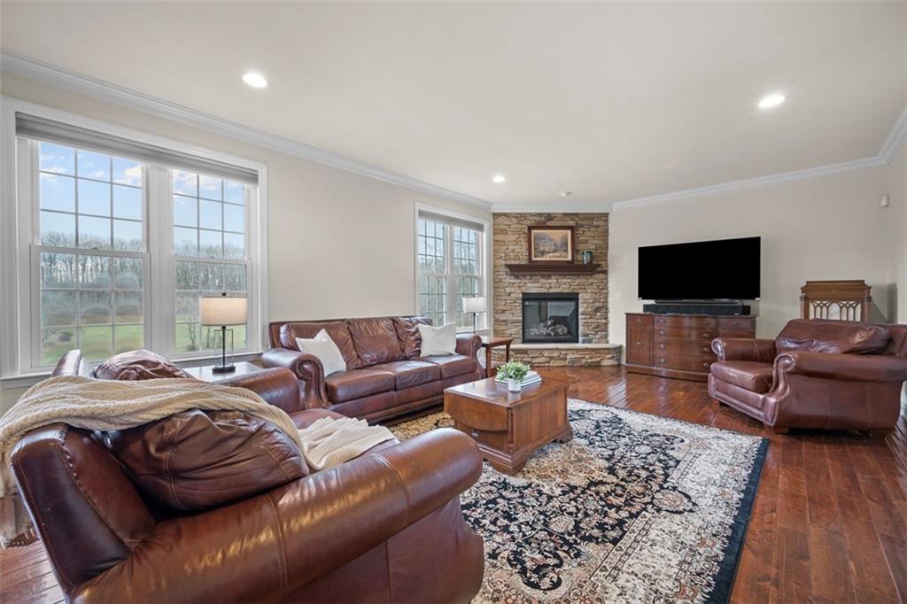 136 Hammond Road Mars, PA 16046 - Photo 8 of 48 a living room with furniture flat screen tv and wooden floor