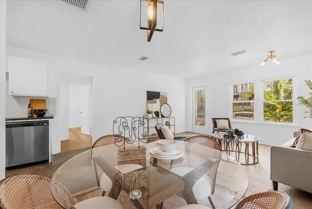 a living room with furniture and window