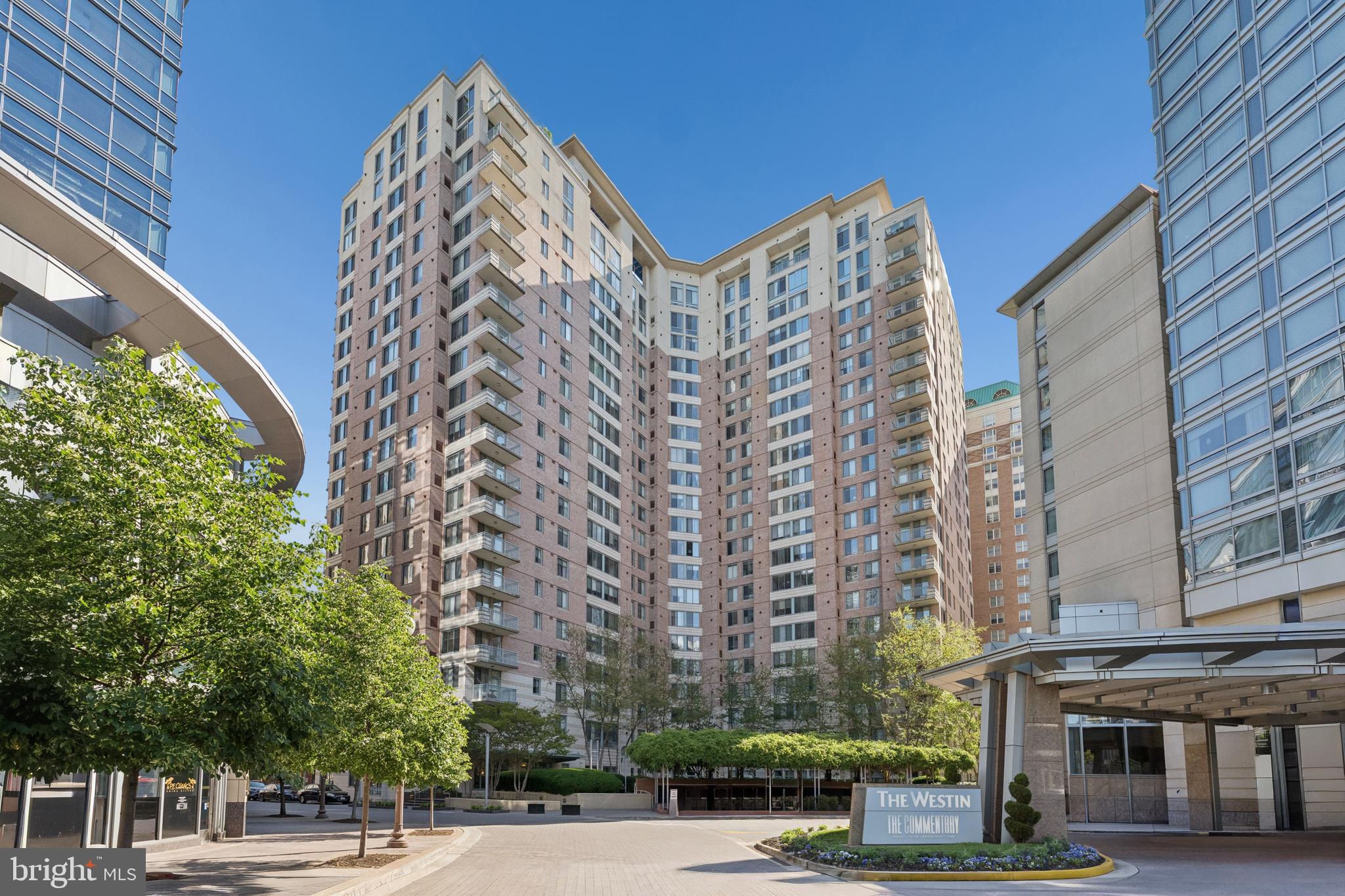 851 North Glebe Road, Unit 706 Arlington, VA 22203 - Photo 2 of 34 a view of a tall building next to a road