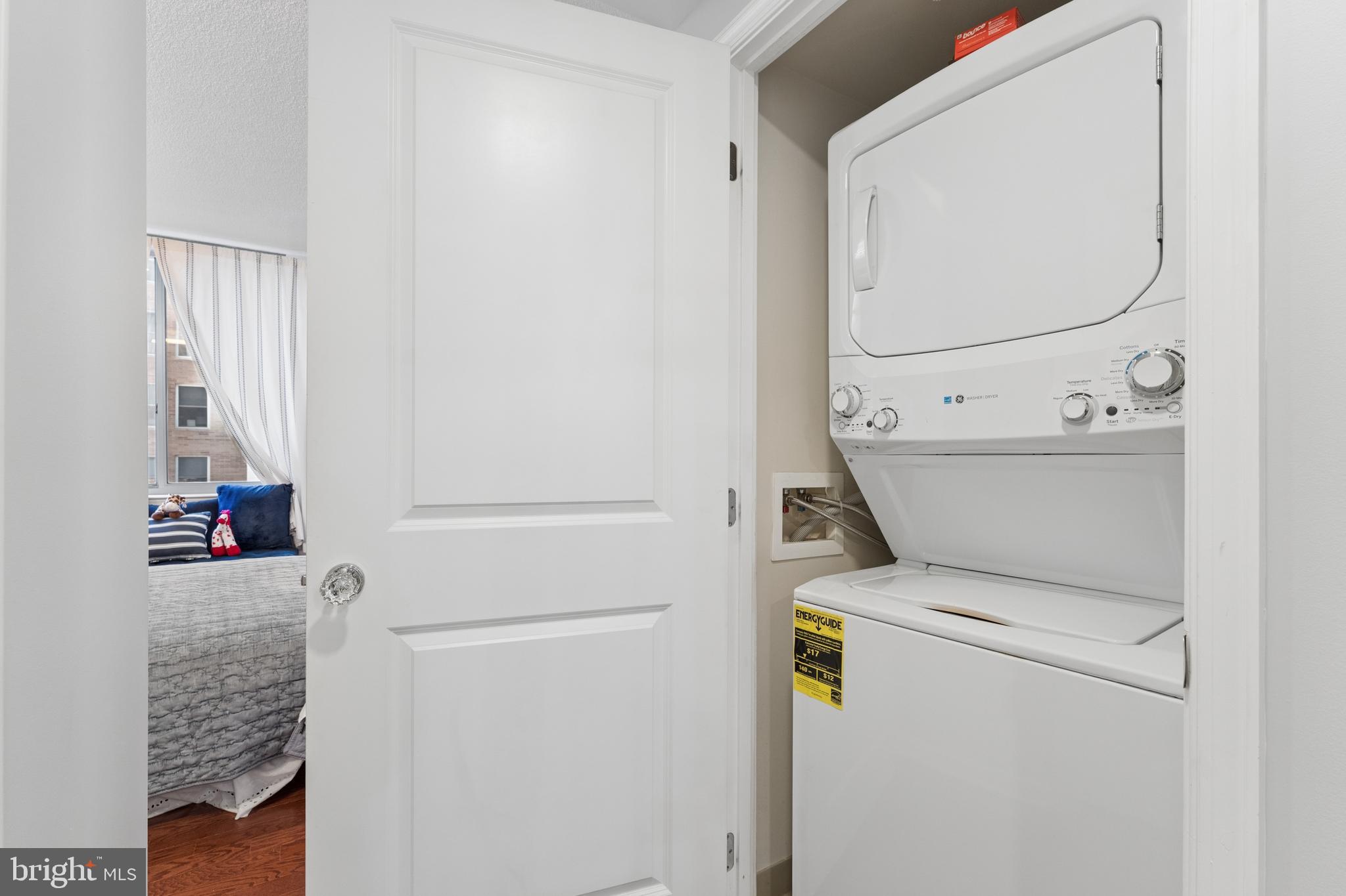 851 North Glebe Road, Unit 706 Arlington, VA 22203 - Photo 20 of 34 a utility room with dryer and washer
