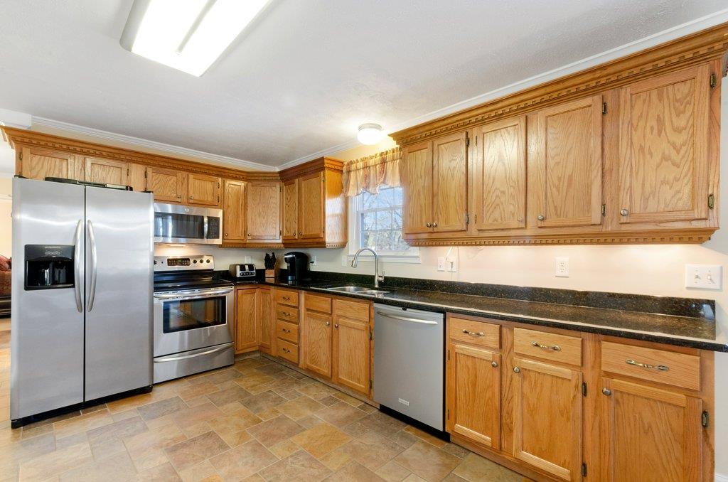 8462 Guthrie Road Cross Plains, TN 37049 - Photo 8 of 21 All of the stainless appliances remain.