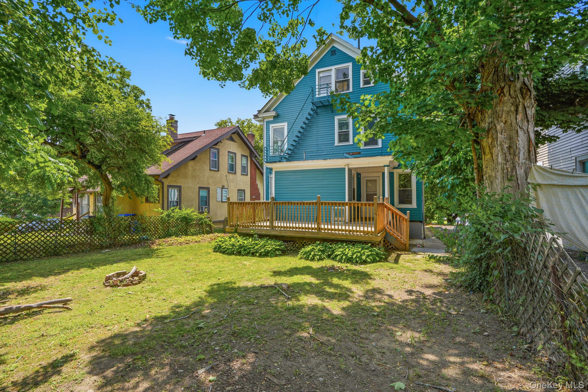 65 North Clinton Street Poughkeepsie, NY 12601 - Photo 38 of 43 a front view of a house with a yard
