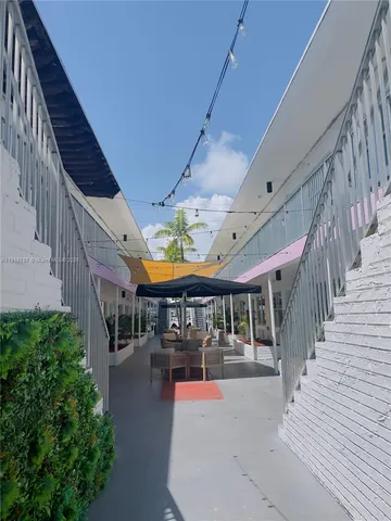 a view of swimming pool with a patio