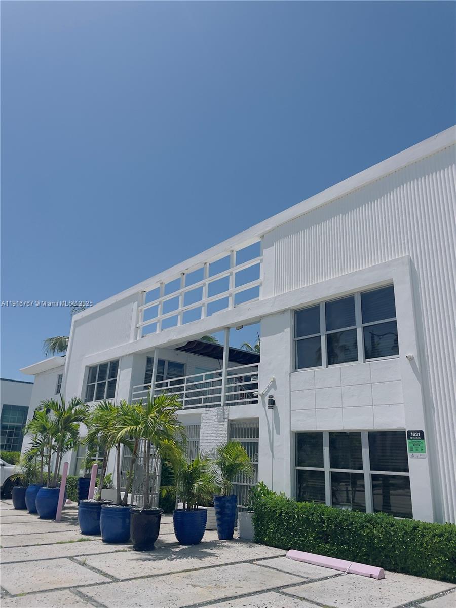 7500 Collins Avenue, Unit 112 Miami Beach, FL 33141 - Photo 8 of 10 a front view of a building