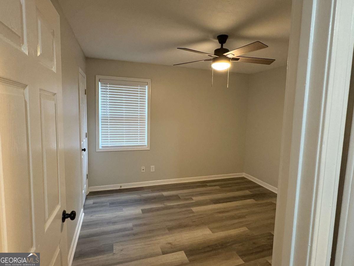 153 A Cox Road Gordon, GA 31031 - Photo 6 of 16 a view of empty room with window
