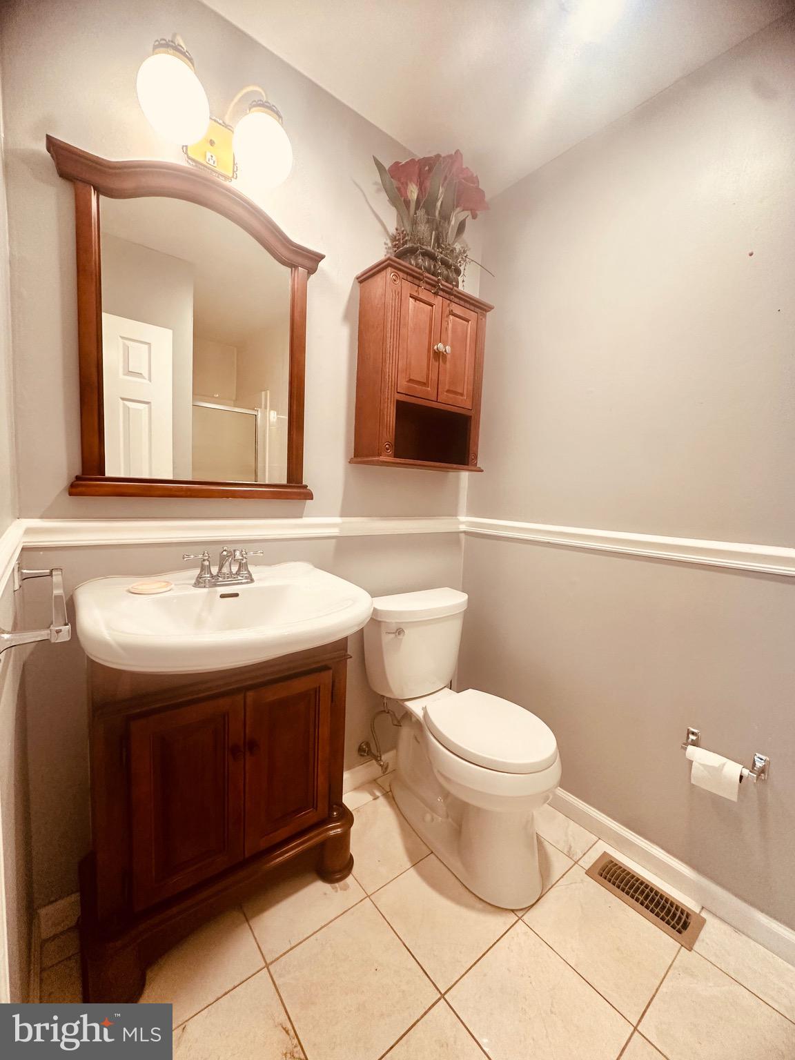 106 Hooton Road Mount Laurel, NJ 08054 - Photo 12 of 24 a bathroom with a sink and a mirror