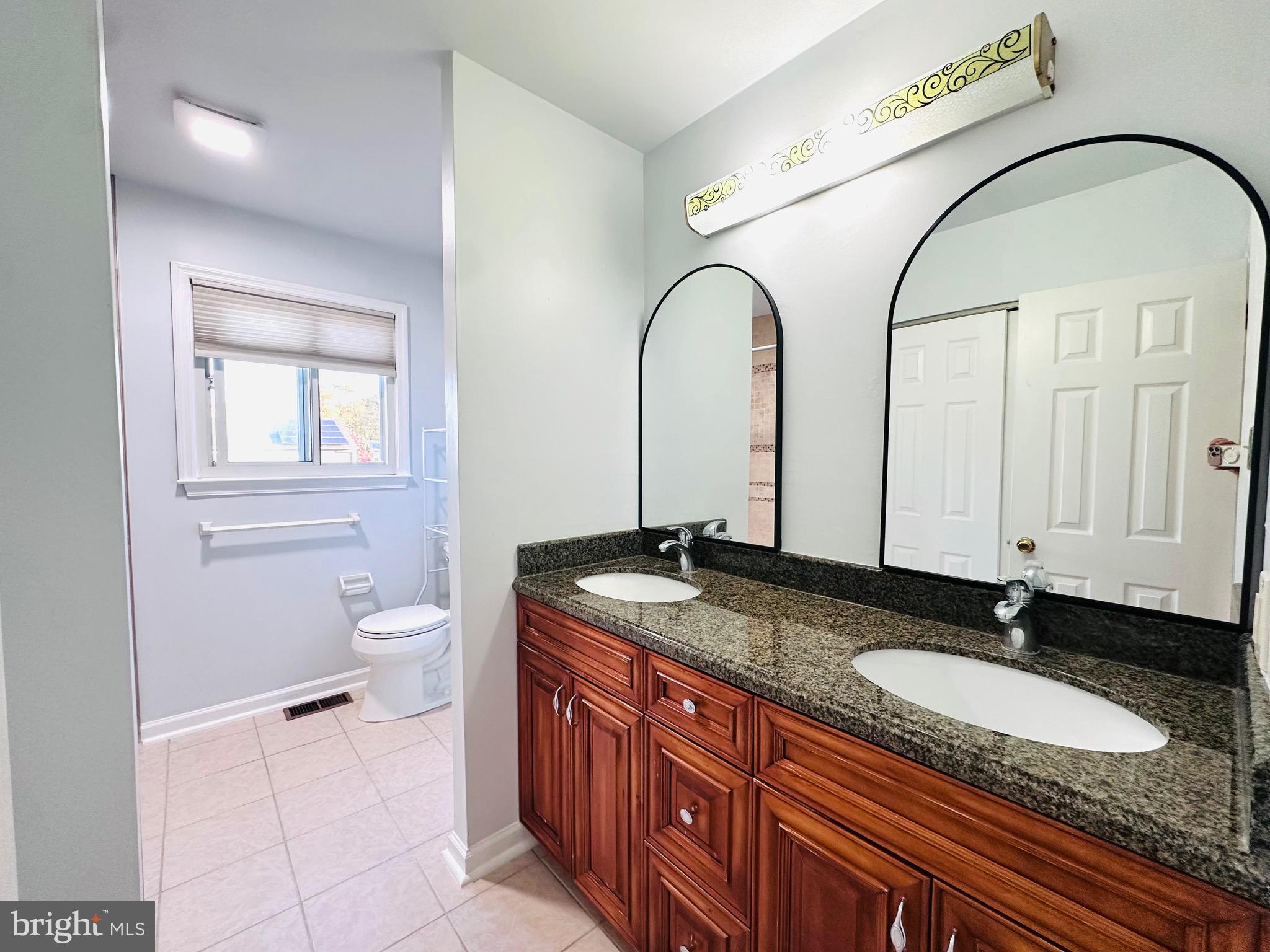 106 Hooton Road Mount Laurel, NJ 08054 - Photo 21 of 24 a bathroom with a granite countertop double vanity sink and mirror