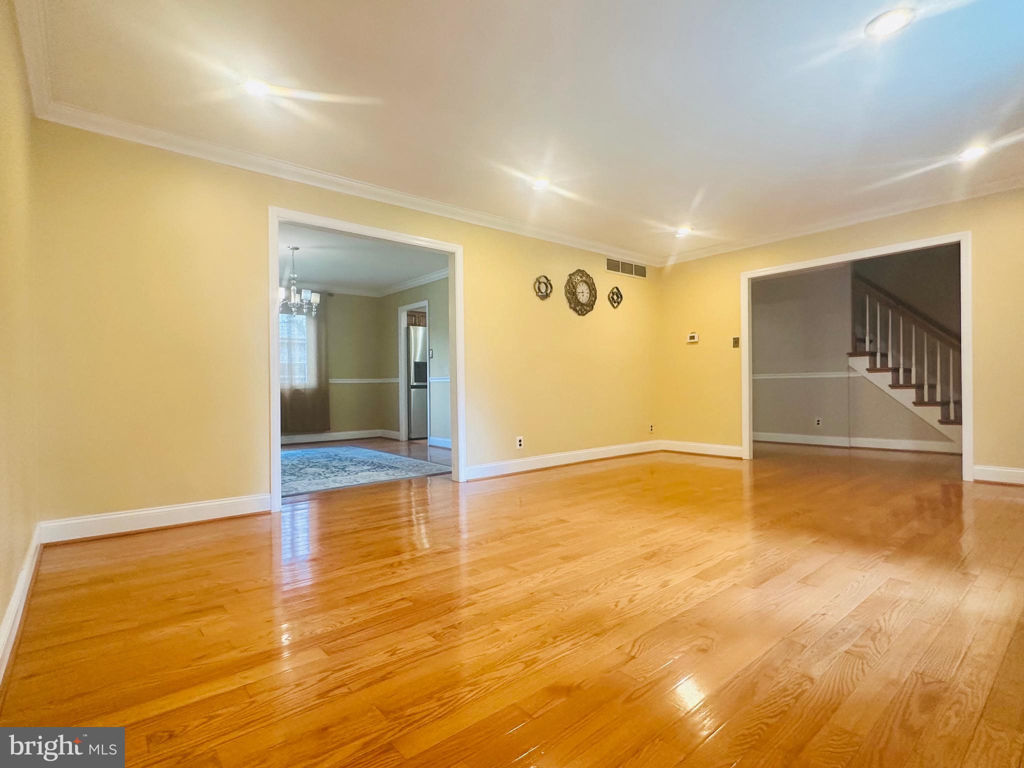 106 Hooton Road Mount Laurel, NJ 08054 - Photo 4 of 24 an empty room with wooden floor and windows