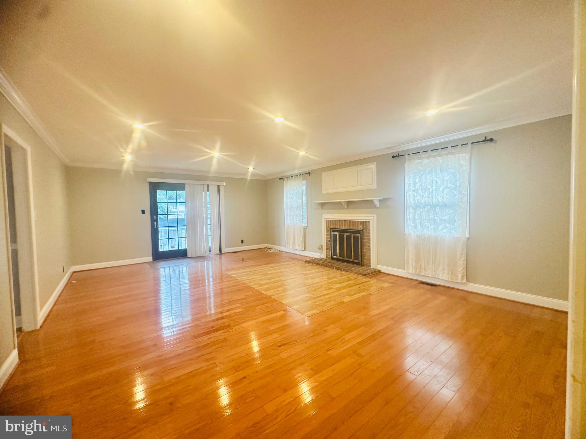 106 Hooton Road Mount Laurel, NJ 08054 - Photo 10 of 24 a view of empty room with wooden floor and fireplace