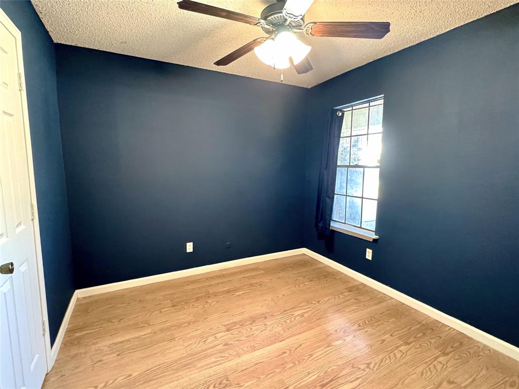 4508 Estes Park Road Haltom City, TX 76137 - Photo 14 of 17 a bedroom with a bed and a window