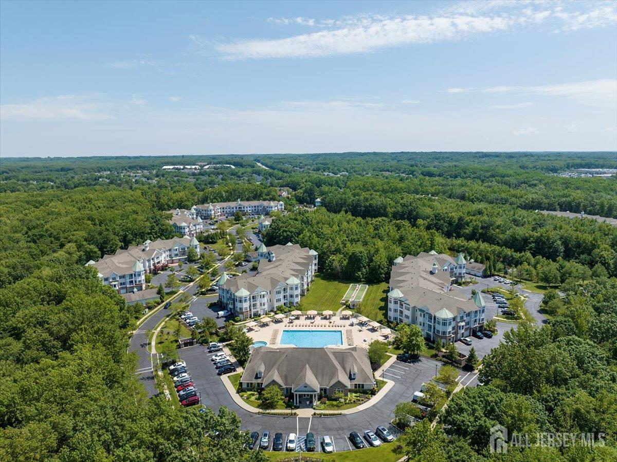 3205 Falston Circle Old Bridge, NJ 08857 - Photo 25 of 44 an aerial view of a house with a garden and lake view