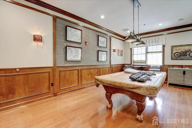 a kitchen with a table and chairs in it
