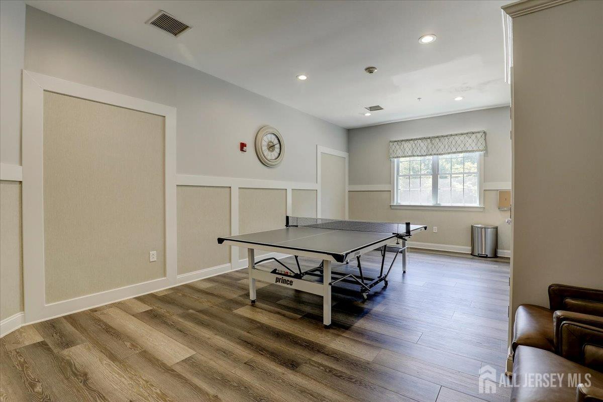 3205 Falston Circle Old Bridge, NJ 08857 - Photo 38 of 44 a living room with furniture a window and wooden floor
