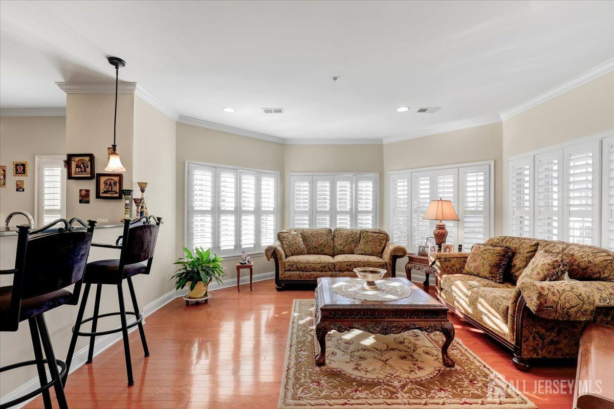 3205 Falston Circle Old Bridge, NJ 08857 - Photo 9 of 44 a living room with furniture wooden floor and a large window