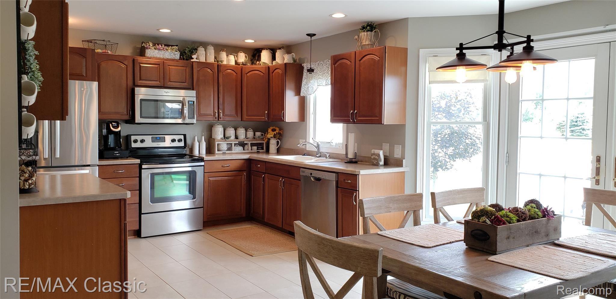 8070 Oak Grove Road Howell, MI 48855 - Photo 10 of 34 Open kitchen with eat-in area.