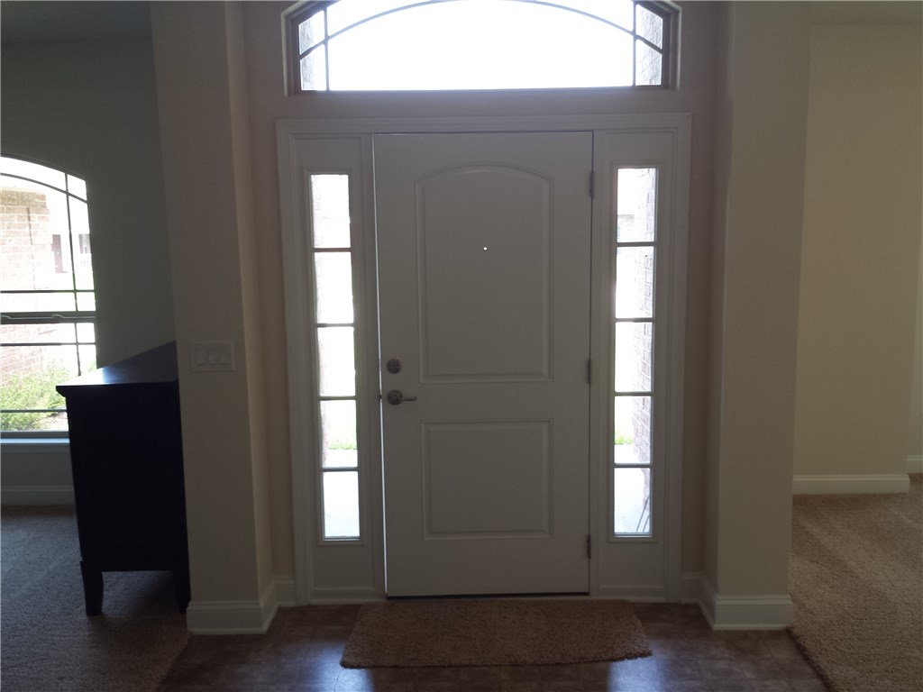 88397 Maybourne Road Yulee, FL 32097 - Photo 8 of 35 a view of an empty room and window