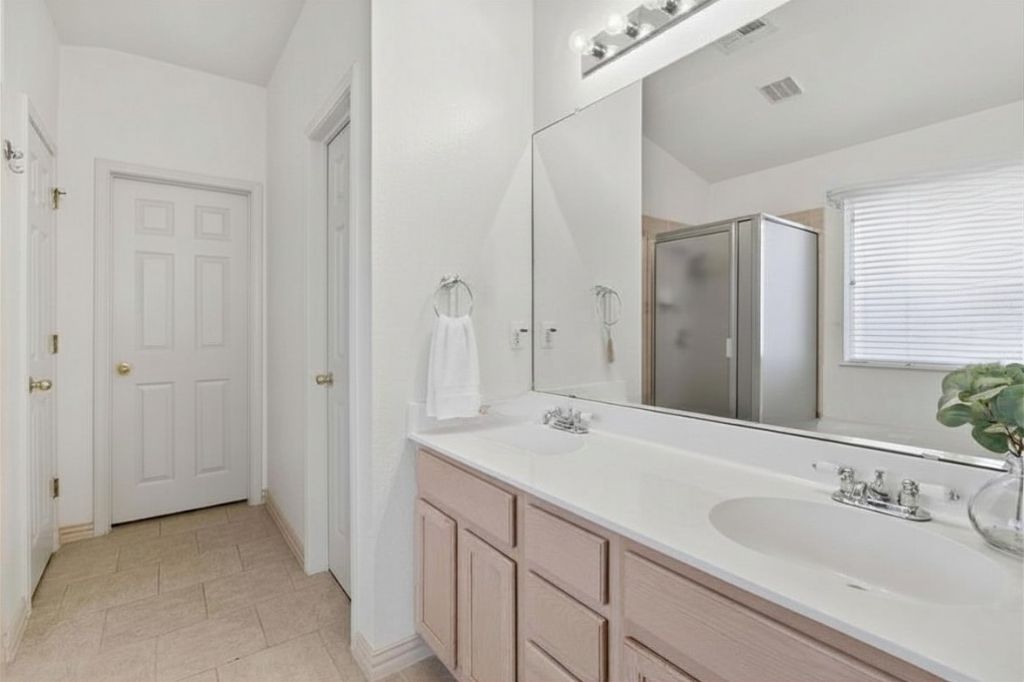 1424 Marsh Harbour Drive Round Rock, TX 78664 - Photo 10 of 23 Primary Bathroom
