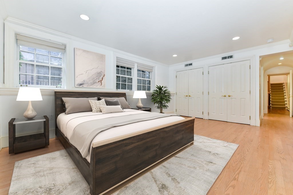 17 Willow Street, Unit 1 Boston, MA 02108 - Photo 18 of 35 a bedroom with bed and window