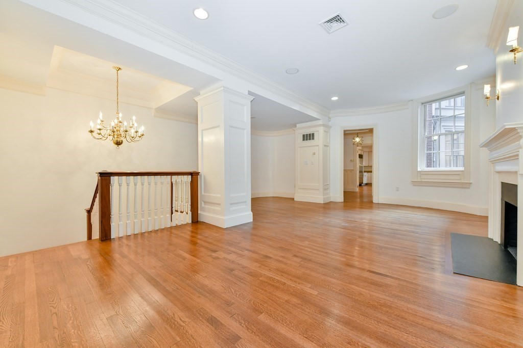 17 Willow Street, Unit 1 Boston, MA 02108 - Photo 19 of 35 a view of a livingroom with a staircase