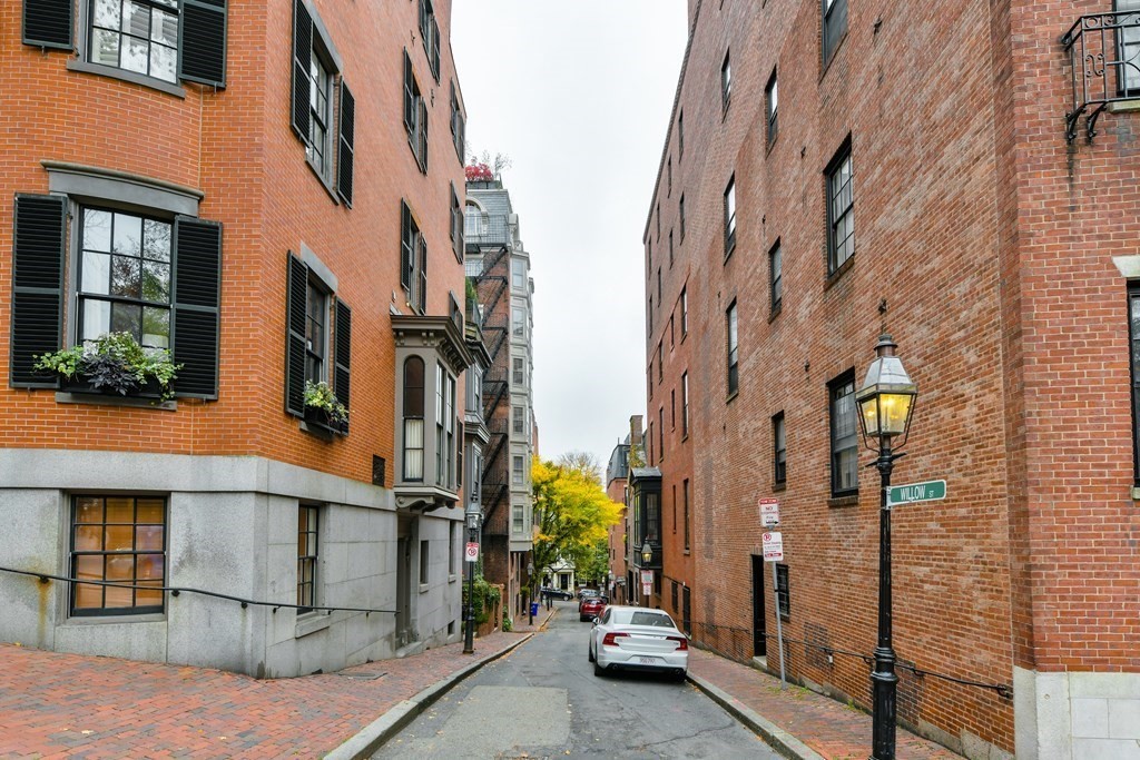17 Willow Street, Unit 1 Boston, MA 02108 - Photo 31 of 35 a view of a brick buildings with entryway doors
