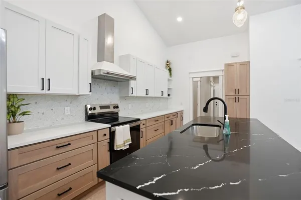 a white bath tub sitting in a bathroom
