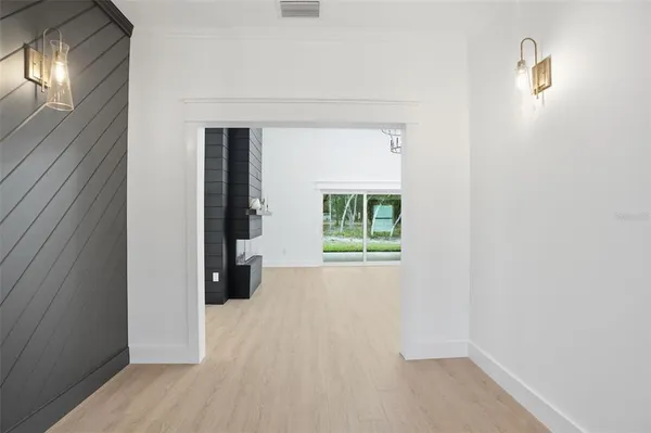 a view of a kitchen with a sink and cabinet area